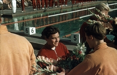 Magyarország, Margitsziget, Budapest, Hajós Alfréd Nemzeti Sportuszoda, XII. Főiskolai Világbajnokság. Piros melegítőben Székely Éva olimpiai bajnok., 1954, Sárosi Imre, színes, nő, úszás, olimpiai bajnok, Fortepan #170968