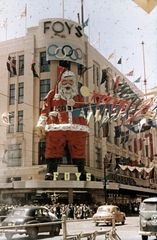 Australia, Melbourne, Bourke Street - Swanston Street sarok., 1956, Sárosi Imre, colorful, olympic symbols, Santa Claus, decoration, Fortepan #171017