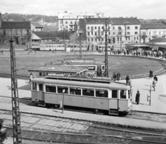 Hungary, Budapest II., Széll Kálmán (Moszkva) tér., 1958, Székács András, ad, Hungarian brand, watch, street view, genre painting, tram, lamp post, tram stop, Ganz-brand, BKVT V-type, Budapest, FVV-organisation, Fortepan #18170