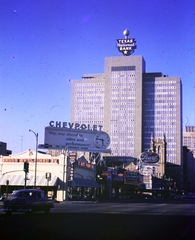 Amerikai Egyesült Államok, Texas állam, Houston, Main Street., 1956, Haas Lajos dr, színes, angol felirat, magasház, köztéri óra, reklám, Fortepan #187330