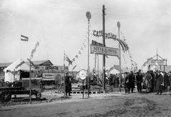 Caterpillar képviselet kiállítása. Forrás/source: National Archives, Washington, USA, RG151 FC., 1931, Négyesi Pál, zászló, férfiak, sátor, traktor, kiállítás, Caterpillar-márka, Magyar Steyr, tábla, látogatók, Fortepan #18848