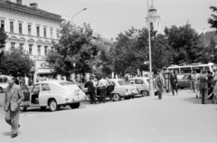 Románia,Erdély, Kolozsvár, Fő tér, háttérben balra a Kossuth Lajos utca sarkán álló evangélikus templom tornya, jobbra a Melody hotel épületének tornya., 1964, Handa család, Fortepan #201637