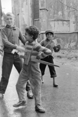 Slovakia, Košice, Franciskánus utca (ulica Františkánska, ekkor ulica Józsefa Attilu) a Fő tér (Hlavná) felé nézve, jobbra a ferences templom., 1974, Kereki Sándor, Czechoslovakia, striped dress, cap, Fortepan #205388