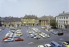 Hungary, Győr, Széchenyi tér, Középen balra a Kenyér köz torkolata, jobbra a Stelczer Lajos utca sarkán a Vastuskós ház és a Xantus János Múzeum (Apátúr ház). Előtérben a Mária oszlop Buda 1686. évi visszafoglalásának emlékére, mögötte a Rába Városi Művelődési Központ (egykori Lloyd székház, ma irodaház)., 1976, FŐFOTÓ, colorful, Fortepan #207037