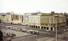 Magyarország, Budapest VII.,Budapest VIII., József körút a Blaha Lujza térnél. Szemben az Akácfa utca torkolata a Rákóczi útnál, jobbra az Erzsébet (Lenin) körút sarkán az EMKE ház., 1978, FŐFOTÓ, színes, Budapest, Fortepan #207303