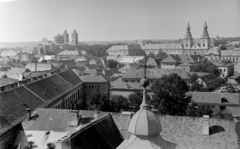 Hungary, Eger, kilátás a Minaretből, előtérben a Szent Sebestyén vértanú templom (volt Irgalmasok temploma) tornyán lévő kereszt. Balra a Főszékesegyház, jobbra a ciszterci templom., 1955, Bernhardt Ágnes, picture, roof, steeple, Fortepan #210262