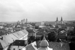 Magyarország, Eger, kilátás a Minaretből, előtérben a Szent Sebestyén vértanú templom (volt Irgalmasok temploma) tornyán lévő kereszt. Balra a Főszékesegyház, jobbra a ciszterci templom látható., 1962, Fortepan/Album051, Fortepan #210322