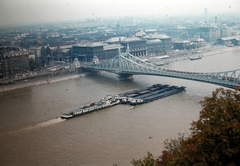 Magyarország, Budapest, Szabadság híd, pesti hídfő és környéke a Gellérthegyről., 1977, Fortepan, hajó, színes, uszály, ősz, látkép, Duna, tolóhajó, Duna-híd, Feketeházy János-terv, Fortepan #21425