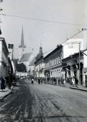 Románia,Erdély, Dés, Strada 1 Mai, háttérben a református templom. A felvétel a magyar csapatok bevonulása idején készült., 1940, Kádár Attila, Szandtner Egon, utcakép, román felirat, Fortepan #220412