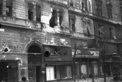 Magyarország, Budapest VII., Erzsébet (Lenin) körút 53., a Király (Majakovszkij) utca sarkánál., 1956, Juricza Tibor, háborús kár, cégtábla, forradalom, szabóság, Budapest, golyónyom, épületkár, Fortepan #23651