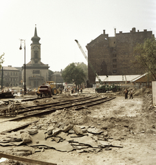 Magyarország, Budapest V.,Budapest IX., Kálvin tér az aluljáró építésekor, háttérben a református templom. A villamos ideiglenes pályaszakasza a Kecskeméti utcánál., 1974, FŐMTERV, Domonkos Endre, színes, Budapest, Fortepan #253508