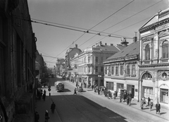 Magyarország, Miskolc, Széchenyi utca, a "villanyrendőr" kereszteződés., 1957, UVATERV, forgalom, autóbusz, magyar gyártmány, utcakép, életkép, jelzőlámpa, Ikarus-márka, Ikarus 30, felsővezeték, Fortepan #2577