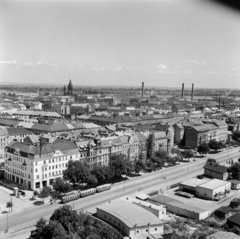 Ausztria, Bécs, Práter, kilátás az óriáskerekéből, elötérben az Ausstellungsstrasse házsora, távolabb a Mexikoplatzon található Franz-von-Assisi-kirche, ettől balra a Reichsbrücke (1976-ban leomlott) látható., 1956, UWM Libraries, madártávlat, képarány: négyzetes, Fortepan #258964