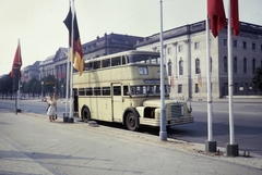 Germany, Berlin, Kelet-Berlin, az Unter den Linden a Bebelplatz-nál. Az autóbusz mögött balra a Városi könyvtár, jobbra a Humboldt Egyetem, 1961, UWM Libraries, East-Berlin, GDR, colorful, flag, double-decker, Bautzen DO 54, Fortepan #259391