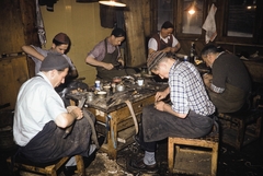 Poland,Tatry Wysokie, Zakopane, a felvétel egy cipőkészítő szövetkezet műhelyében készült., 1960, UWM Libraries, workshop, shoe repair, plaid shirt, workplace, shoemaker, colorful, Fortepan #260223