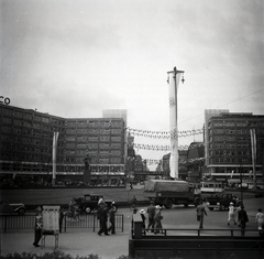 Németország, Berlin, Alexanderplatz, balra az Alexanderhaus, jobbra a Berolinahaus., 1936, Lőrincze Judit, szobor, teherautó, villamos, horogkereszt, olimpia, automobil, utcanévtábla, modern építészet, Peter Behrens-terv, kerékpár, Fortepan #26114