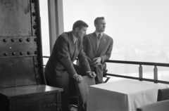 France, Paris, Eiffel-torony. A felvétel a Budapesti Honvéd túráján készült, Bányai Nándor és Machos Ferenc., 1955, Faragó György, riveted steel, restaurant, vest, tie, suit, prop up on elbows, fog, looking into the distance, Fortepan #261826