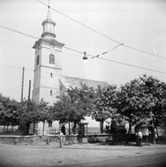 Hungary, Budapest XXII., Nagytétényi út (Vörös Hadsereg útja), Nagyboldogasszony-templom, balra a Szabadság utca., 1958, Vozárik Edit, Budapest, church clock, phone booth, Fortepan #270170