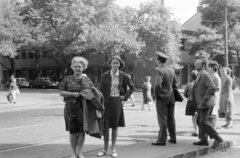 Hungary, Budapest VI.,Budapest XIII., Lehel utca, villamosmegálló a Bulcsú utcánál., 1965, Ungváry Rudolf, Budapest, uniform, akimbo, coat draped over arm, pedestrian, tram stop, safety island, Fortepan #270575