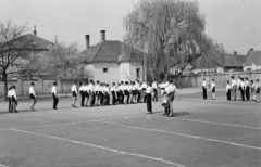 Hungary, Csorna, Árpád utca, ünnepség résztvevői az általános iskola udvarán (később Széchenyi István Általános Iskola)., 1959, Lipovits Károly, pioneer, drum, Fortepan #271732