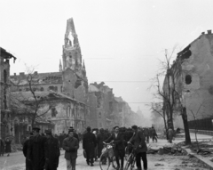 Magyarország, Budapest VIII.,Budapest IX., Üllői út, szemben a Viola utca - Bokréta utca közötti romos házsor, középen az Örökimádás templom látható. A felvétel a jobbra láthatóBókay utca torkolatának közelében készült., 1956, Papp Dezső, utcakép, épületkár, templom, Budapest, forradalom, Fortepan #272718