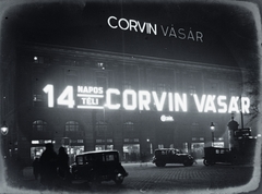 Magyarország, Budapest VIII., Blaha Lujza tér, Corvin Áruház., 1930, Flanek-Falvay-Kováts, Best of, Corvin Áruház, Budapest, este, neonreklám, éjszaka, díszkivilágítás, Fortepan #272942