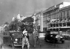 Franciaország, Nizza, Promenade des Anglais., 1938, Fortepan, német gyártmány, Opel-márka, pálmafa, automobil, Opel Kadett, összekulcsolt kéz, autón ülni, kerékpár, Fortepan #28429