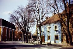 Magyarország, Kőszeg, Kossuth Lajos utca, balra a Hotel Írottkő, jobbra a Várkör sarkán álló ház, távolabb a Fő (Köztársaság) téren a Jézus Szíve-templom látható., 1980, Kozák, színes, Fortepan #286599