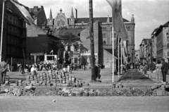 Magyarország, Budapest IX., Kinizsi utca a Közraktár utca felől nézve, háttérben a Központi Zálogház (Lónyay utca 30-32.), 1949, Fortepan, tűzfal, ünnep, Budapest, kockakő, Fortepan #30051