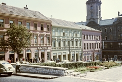 Magyarország, Pécs, Széchenyi tér a Dzsámi elöl a Városháza felé nézve., 1960, Építésügyi Dokumentációs és Információs Központ, VÁTI, színes, taxi, neonreklám, rendszám, Fortepan #31214