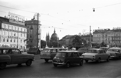 Ausztria, Bécs, Mariahilfer Gürtel, középen a Maria vom Siege (győzedelmes Mária) templom, 1964, Beyer Norbert, forgalom, német gyártmány, brit gyártmány, Opel-márka, neonreklám, Austin-márka, automobil, BMC Mini, Fortepan #32455