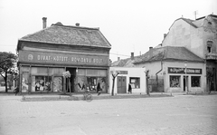 Magyarország, Nagykőrös, Szabadság tér, balra a Tomori utca torkolata., 1969, Építésügyi Dokumentációs és Információs Központ, VÁTI, kerékpár, kerékpár tároló, Fortepan #32515