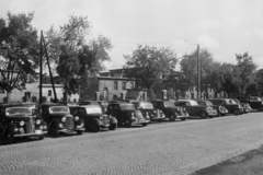 Magyarország, Budapest IX., Könyves Kálmán körút az FTC pályával szemben., 1949, Kovács Márton Ernő, német gyártmány, brit gyártmány, Steyr-márka, osztrák gyártmány, Opel-márka, Mercedes-márka, Austin-márka, DKW-márka, parkoló, Wanderer-márka, automobil, Mercedes W136, Opel Kadett, Austin Ten, DKW F5/F7/F8, Steyr 100/200, Wanderer W23, Budapest, Fortepan #33041