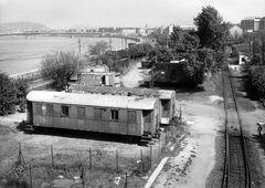 Magyarország, Budapest IX., Dunaparti teher pályaudvar az Összekötő vasúti hídtól a Petőfi híd felé nézve., 1989, Ferencvárosi Helytörténeti Gyűjtemény, vasút, híd, vagon, Duna, sínpálya, Budapest, teherpályaudvar, Duna-híd, Álgyay Hubert Pál-terv, Fortepan #39314