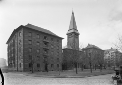 Magyarország, Budapest XI., Október huszonharmadika (Schönherz Zoltán) utca a Fehérvári út felé nézve., 1953, UVATERV, teherautó, rendszám, Budapest, lakóház, bérház, templom, református, Fortepan #3970