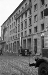 Magyarország, Budapest VIII., II. János Pál pápa (Köztársaság) tér 26. MDP Budapesti Pártbizottságának székháza., 1956, Nagy Gyula, háborús kár, zászló, pártház, forradalom, épületkár, kompresszor, Budapest, Fortepan #39916