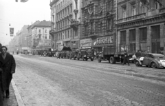 Hungary, Budapest VIII.,Budapest VII., Rákóczi út a Nagykörút felé nézve., 1956, Nagy Gyula, sign-board, revolution, commercial vehicle, automobile, convoy, Budapest, Fortepan #40248