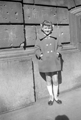 Hungary, Budapest VII., Jósika utca 2., 1957, Fortepan, portrait, smile, girl, Budapest, hands in pockets, bullet hole, Fortepan #5041