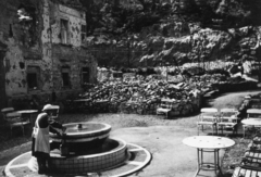 Hungary, Budapest I., Döbrentei tér, ivókút a lerombolt Rudas fürdő mellett., 1945, Kramer István dr, Kunszt János, war damage, Budapest, table, drinking fountain, apron, chair, woman, Fortepan #52100