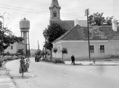 Hungary,Lake Balaton, Siófok, Fő utca, Víztorony., 1948, Gyöngyi, neon sign, aerial wire, church clock, rubber industry, Fortepan #5478