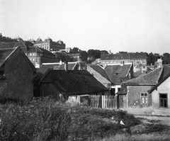 Magyarország, Tabán, Budapest I., Kereszt tér, szemben az Aranykacsa utca torkolata. Balra a Bethlen-udvar, felette a Királyi Palota (később Budavári Palota) látszik., 1933, Magyar Bálint, látkép, Budapest, Fortepan #55907