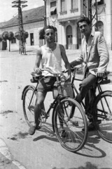 Hungary, Csorna, Szent István (Szabadság) tér, háttérben a Községháza., 1959, Lipovits Károly, bicycle, portrait, Fortepan #61875