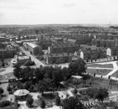 Hungary, Oroszlány, kilátás a víztoronyból a Mátyás király utca - Mészáros Lajos utca kereszteződése felé. Előtérben a Vidámpark játékai., 1967, Magyar Rendőr, bird's eye view, Fortepan #65549