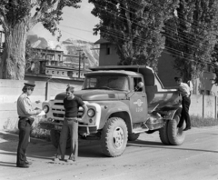 Hungary, Bélapátfalva, IV. Béla (Lenin) út a cementgyár előtt. Háttérben a mészkőbánya a Bél-kő oldalában., 1976, Magyar Rendőr, commercial vehicle, ZIL-brand, cop, Fortepan #66211