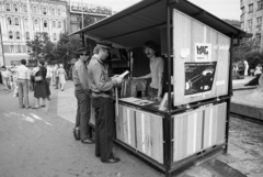 Hungary, Budapest VIII., Blaha Lujza tér., 1984, Magyar Rendőr, Budapest, record store, billy club, record, Videoton-brand, poster, cop, neon sign, reading, Fortepan #67135