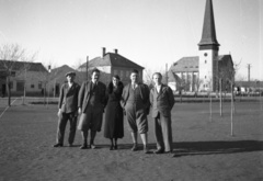 Hungary, Püspökladány, Rákóczi Ferenc utca, háttérben a Szent Péter és Pál templom., 1935, Lissák Tivadar, hands behind the back, hands in pockets, Fortepan #73117