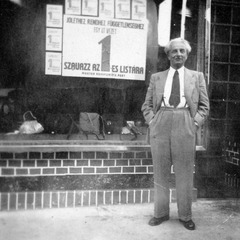 Hungary, 1947, Fortepan, Show window, man, slogan, hands in pockets, Fortepan #7329