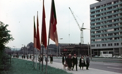 Germany, Dresden, Sankt Petersburger Strasse (Leningrader Straße), háttérben a Főpályaudvar., 1969, Kristek Pál, colorful, flag, construction, GDR, Fortepan #75554