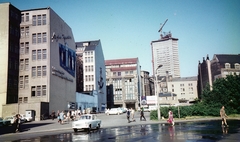 Germany, Leipzig, Burgplatz a Petersstrasse felé nézve. A háttérben épül az egyetem toronyépülete., 1969, Kristek Pál, colorful, Trabant-brand, construction, GDR, high-rise building, Fortepan #75562