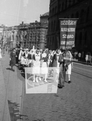 Hungary, Budapest VIII., Népszínház utca a József körút felé nézve. Május 1-i felvonulás., 1946, Berkó Pál, march, 1st of May parade, erroneous photo, Budapest, scaffolding, nurse, Fortepan #79263